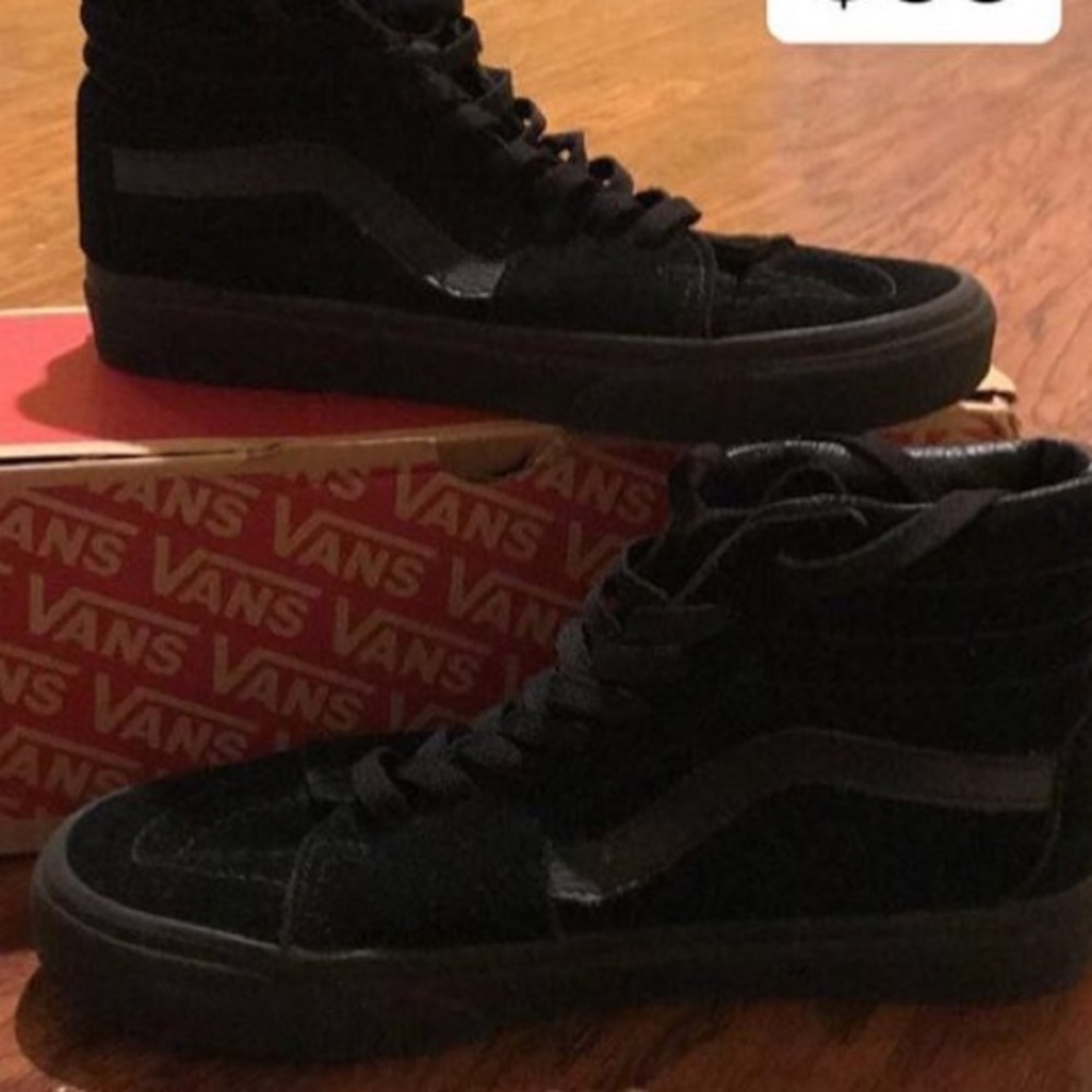 All black Sk8-Hi vans